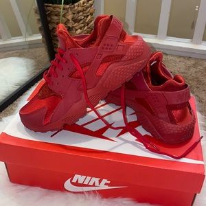 All red Nike Air Huarache Run